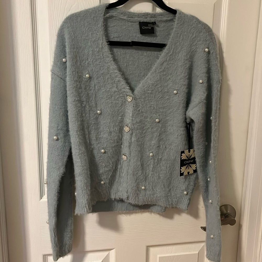 NWT Cliche blue sweater with pearls and silver heart buttons. Size large.